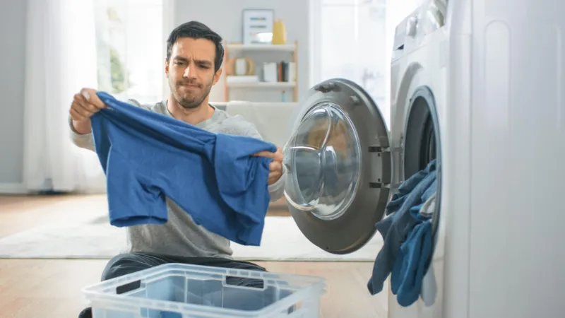 how to get gasoline smell out of washing machine
