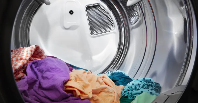 how to get gasoline smell out of washing machine
